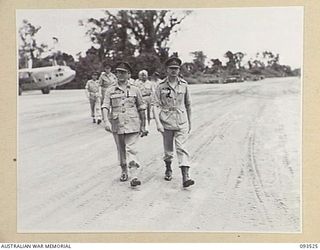 TOROKINA, BOUGAINVILLE. 1945-07-03. HIS ROYAL HIGHNESS, THE DUKE OF GLOUCESTER, GOVERNOR-GENERAL OF AUSTRALIA (2), ACCOMPANIED BY LIEUTENANT GENERAL S.G. SAVIGE, GENERAL OFFICER COMMANDING 2 CORPS ..