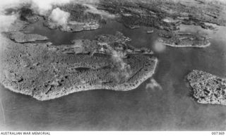 An aerial view of  the town area (centre) and the harbour clearly seen from a height of 2000 feet