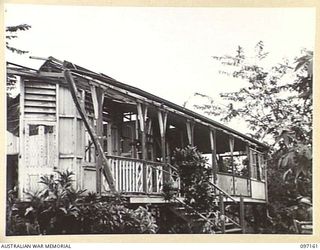 THE REMAINS OF THE RABAUL HOSPITAL WHICH IS NOW USED AS THE OFFICERS MESS, 11 DIVISION SIGNALS