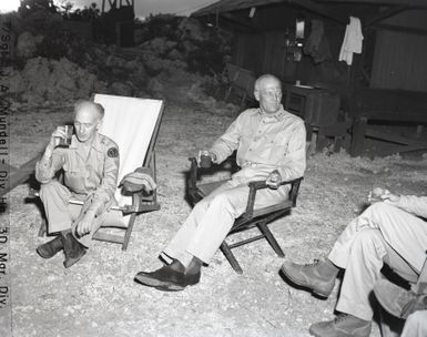 Photograph of Ernie Pyle with Major General Erskine in Guam