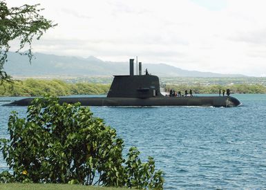 The Australian Navy Collins Class Submarine, Her Majestys Australian Ship (HMAS) RANKIN (SSK 78), enters Pearl Harbor for a port visit after completing exercises in the Pacific region. RANKIN is currently testing the deployment of women onboard Australian submarines after completing modifications to the boat. On December 12, 1992, the Minister for Defense Science and Personnel announced that women would be eligible for service in the Collins-class submarines after a Submarine Integration Study (SIS)