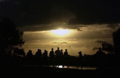 U.S. Air Force Airmen from the 13th Air Force and 36th Air Expeditionary Wing, and U.S. Navy Sailors from Helicopter Combat Support Squadron 5 (HC-5), participates in a 5K run during the Team Andersen Challenge at Andersen Air Base, Guam, on Feb. 25, 2005. (U.S. Air Force PHOTO by STAFF SGT. Bennie J. Davis III) (Released)