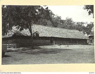 PORT MORESBY, NEW GUINEA. 1944-05-01. THE ADMINISTRATION BUILDING IN THE CAMP STAFF AREA HOUSING THE DEPUTY DIRECTOR OF MECHANICAL ENGINEERING, HEADQUARTERS NEW GUINEA FORCE