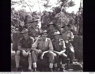 SOGERI, NEW GUINEA. 1943-11-06. GROUP PORTRAIT OF OFFICER INSTRUCTORS OF THE NEW GUINEA FORCE TRAINING SCHOOL. LEFT TO RIGHT: FRONT ROW: QX6075 CAPTAIN (CAPT) E. P. JONES; VX45245 CAPT W. MARTIN; ..