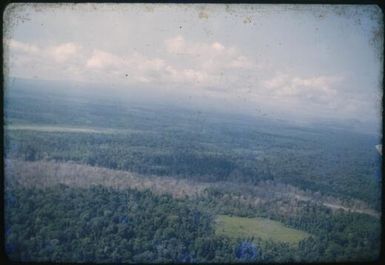 Aerial view of the devastated area below Higataru following the Mt. Lamington eruption, Papua New Guinea, 1951 / Albert Speer