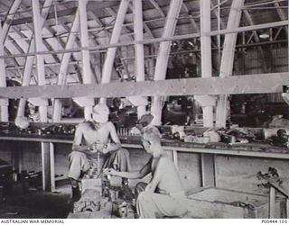 Late party of Japanese prisoners at a base. Japanese prisoners worked in the War Criminal Compound under RAN supervision repairing engines and other mechanical equipment. Work on an RAN base ..