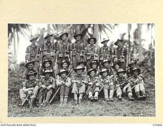 MADANG, NEW GUINEA. 1944-07-02. PERSONNEL OF THE MEDIUM MACHINE GUN PLATOON, HEADQUARTERS COMPANY, 24TH INFANTRY BATTALION. IDENTIFIED PERSONNEL ARE:- VX123362 LANCE CORPORAL G.N. NUNN (1); ..