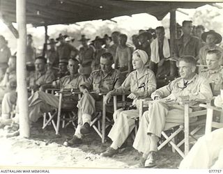 MALAHANG BEACH, LAE, NEW GUINEA. 1944-12-31. THE OFFICIAL STAND DURING THE CHRISTMAS SURF CARNIVAL ORGANISED BY NX26061 CAPTAIN R.W. DIBBIN, DEPUTY ASSISTANT DIRECTOR OF ORDNANCE SERVICES, LAE BASE ..