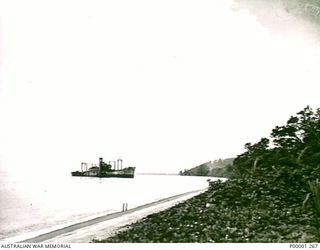 THE SOLOMON ISLANDS, 1945-10-14. A SHIP WHICH WAS GROUNDED CLOSE TO THE BEACH ON BOUGAINVILLE ISLAND DURING WW2. (RNZAF OFFICIAL PHOTOGRAPH.)