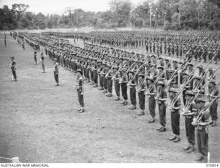 LAE, NEW GUINEA, 1944-03-08. A JOIN-UP PHOTOGRAPH OF THE 29TH INFANTRY BRIGADE ON PARADE PRIOR TO INSPECTION BY VX20308 MAJOR-GENERAL F.H. BERRYMAN, CBE, DSO, GENERAL OFFICER COMMANDING 2ND ..