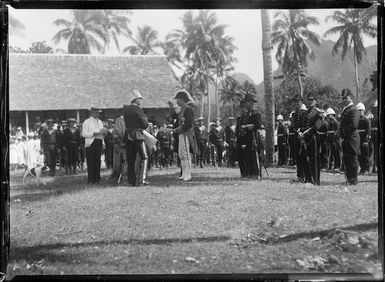 Ceremony with naval officers of HMS Mildura during a cruise of the Cook Islands