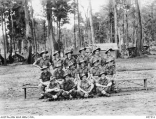 Group portrait of the band, Battalion Headquarters, 58/59 Infantry Battalion. Identified, back row, left to right: Private (Pte) McKinney; Pte G Beet; Pte L Suckling; Pte K McBride; Pte J Stevens; ..