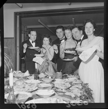 Unidentified guests dining at a buffet, at Lower Hutt Plunket Society's Hawaiian Island Ball