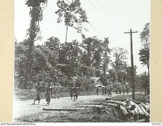 LAE, NEW GUINEA. 1944-09-17. NATIVE WORKERS WITHIN THE CAMP AREA 43RD FIELD ORDNANCE DEPOT