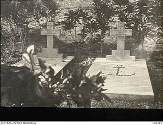 The graves of 45 Able Seaman (AB) John Courtney (AB J E Walker served as John Courtney), Royal Australian Naval Reserve, died of wounds, and Lieutenant Commander C B Elwell, Royal Navy, killed in ..