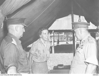 RABAUL, NEW BRITAIN. 1945-10-27. GENERAL SIR THOMAS A. BLAMEY, COMMANDER-IN-CHIEF, ALLIED LAND FORCES, SOUTH WEST PACIFIC AREA (3) TALKING TO CAPTAIN H.C. WITT, OFFICER COMMANDING, OF AUSTRALIAN ..