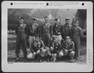 A crew of the 43rd Bomb Group, based on Dobodura Airstrip, Papua, New Guinea, poses beside the Consolidated B-24 "Lucky Lucille." (U.S. Air Force Number 72383AC)