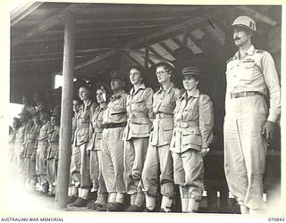 LAE, NEW GUINEA, 1944-03-08. OFFICIAL GUESTS, INCLUDING MEMBERS FROM THE UNITED STATES FORCES, THE ROYAL AUSTRALIAN AIR FORCE, LAE BASE SUB-AREA, AND THE 2/7TH AUSTRALIAN GENERAL HOSPITAL, AT THE ..