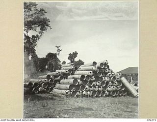 LAE, NEW GUINEA. 1944-09-27. A LARGE STACK OF SUPPLY DROPPING CONTAINERS AWAITING REPAIR AT THE 43RD FIELD ORDNANCE DEPOT