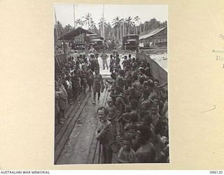 MUSCHU ISLAND, NEW GUINEA. 1945-09-11. MUSCHU ISLAND NATIVES LOADED ON AUSTRALIAN BARGES WAITING TO BE TRANSFERRED TO THE NEW GUINEA MAINLAND, WHERE THEY WILL BE REHABILITATED BY AUSTRALIAN NEW ..