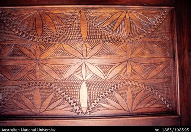 Samoa - carving of flowers in wood