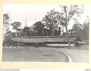 LAE, NEW GUINEA. 1945-04-08. THE EXTERIOR OF THE OFFICERS CLUB, HEADQUARTERS FIRST ARMY, DURING THE VISIT OF SENATOR J.M. FRASER, ACTING MINISTER FOR THE ARMY, TO THE AREA