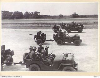 TOROKINA, BOUGAINVILLE. 1945-10-22. A CEREMONIAL PARADE AND MARCH PAST BY 29 INFANTRY BRIGADE WAS HELD FOR MAJOR-GENERAL BRIDGEFORD, GENERAL OFFICER COMMANDING 3 DIVISION, AT TOROKINA AIRFIELD. ..