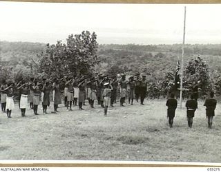 HOPOI, NEW GUINEA, 1943-10-30. ALL THE VILLAGE CHIEFS (LULAIS) AND THEIR SECONDS IN COMMAND (TULTULS), ATTENDED A CONFERENCE WITH NX155085 CAPTAIN R.G. ORMSBY OF THE AUSTRALIAN AND NEW GUINEA ..