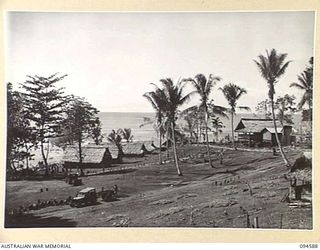 SIPILANGAN, NEW BRITAIN, 1945-07-27. THE AUSTRALIAN NEW GUINEA ADMINISTRATIVE UNIT REFUGEE CAMP BUILT IN THE WIDE BAY AREA. AT PRESENT IT HOUSES APPROXIMATELY 600 NATIVES WHO HAVE COME IN FROM ..