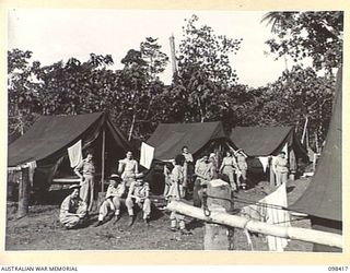 RABAUL, NEW BRITAIN. 1945-10-31. AUSTRALIAN ARMY MEDICAL WOMEN'S SERVICE PERSONNEL OF THE NEWLY ESTABLISHED 118 GENERAL HOSPITAL, TEMPORARILY QUARTERED IN TENTS