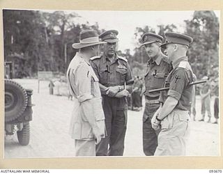 HONGORAI RIVER, BOUGAINVILLE, 1945-07-04. HIS ROYAL HIGHNESS, THE DUKE OF GLOUCESTER, GOVERNOR-GENERAL OF AUSTRALIA (1) WITH MAJOR-GENERAL W. BRIDGEFORD, GENERAL OFFICER COMMANDING (2), BRIGADIER ..