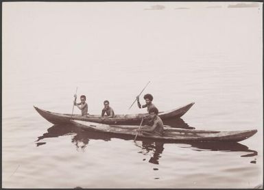People of Choiseul in two canoes on the Pachu River, Solomon Islands, 1906 / J.W. Beattie