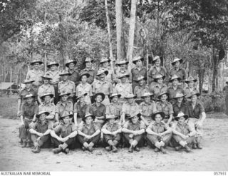 DOBODURA, NEW GUINEA. 1943-10-11. GROUP PORTRAIT OF "G", "A" AND "Q" CLERKS OF HEADQUARTERS, 11TH AUSTRALIAN DIVISION. LEFT TO RIGHT: BACK ROW: NX97368 PRIVATE (PTE) F. CLARKE; WX28991 PTE R. M. ..