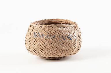 Small round coconut leaf basket