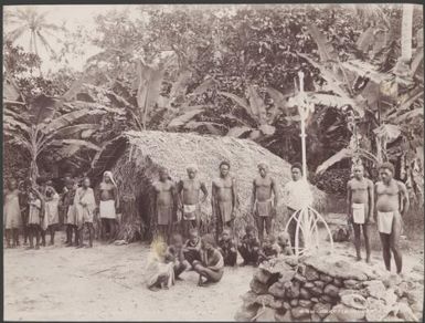 Villagers at the Patteson Memorial Cross, Nukapu, Reef Islands, 1906, 1 / J.W. Beattie