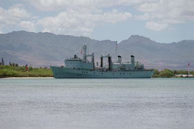 Port bow view of the Canadian replenishment ship HMCS PROTECTEUR (AOR 509) departing Pearl Harbor to take part in Operation RIMPAC 2000