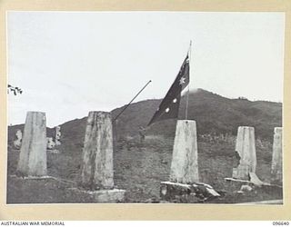 THE AUSTRALIAN FLAG, SIZE 30 X 15, WHICH WAS TAKEN TO RABAUL AND ERECTED OVER THE RUINS OF THE FORMER GOVERNMENT HOUSE. THE NAMES OF 5 DIVISION OFFICERS ARE STENCILLED ON THE FLAG. FOLLOWING THE ..