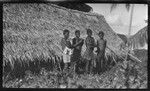 Young men outside a building