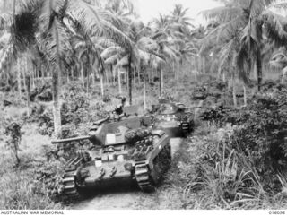 FINSCHHAFEN AREA, NEW GUINEA. 9 NOVEMBER 1943. MATILDA TANKS CARRYING OUT TRAINING MANOEUVRES PREPARATORY TO THEIR USE IN ACTION AGAINST THE JAPANESE STRONG POSTS IN THE FINSCHHAFEN AREA