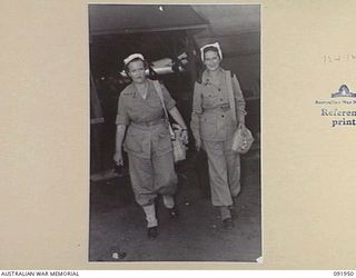 TOROKINA, BOUGAINVILLE, 1945-04-18. AUSTRALIAN ARMY NURSING SERVICE NIGHT STAFF FROM 2/1 GENERAL HOSPITAL COMING OFF DUTY. IDENTIFIED PERSONNEL ARE:- SISTER S.A. LEONARD (1); SISTER L.G. O'ROURKE ..