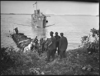 Infantry landing craft arriving at Tangalan Plantation, Nissan Island, Papua New Guinea, during World War 2