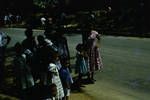 Papuans waiting to see ANZAC Day Parade, Port Moresby, [Papua New Guinea], 1960