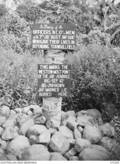 MILNE BAY, NEW GUINEA. 1944-02-12. THIS CAIRN OF STONES POSITIONED HALFWAY ALONG THE NORTH SIDE OF THE TURNBULL STRIP MARKS THE WESTERN MOST POINT OF THE JAPANESE ADVANCE ON THE NIGHT OF THE 30TH ..