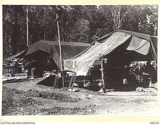 TOKO, SOUTH BOUGAINVILLE. 1945-08-30. BLACKSMITH AND WELDING SHOP AT 129 INFANTRY BRIGADE WORKSHOP