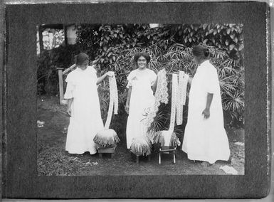 Young women wearing white dresses, with lace, Samoa