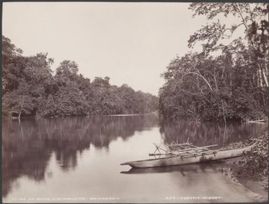 A canoe on the Fiu River, Malaita, Solomon Islands, 1906 / J.W. Beattie