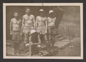 [Group of Men Standing on Porch]
