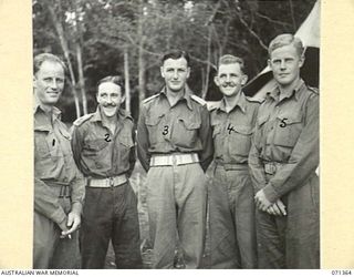 GUSIKA, NEW GUINEA. 1944-03-17. OFFICERS OF C SQUADRON, 1ST TANK BATTALION. IDENTIFIED PERSONNEL ARE:- NX123452 LIEUTENANT J.G. EMMOTT (1); VX543 LIEUTENANT J.L. OSWELL (2); NX131842 LIEUTENANT ..