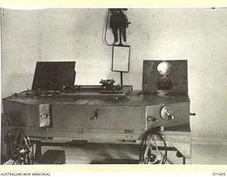 PORT MORESBY, PAPUA, NEW GUINEA. 1944-03-27. THE T.F.D. (LP) AUSTRALIA SHOWING LOCAL MODIFICATION AND ARRANGEMENTS OF 103 CONVERTER RECEIVER DIALS ON THE BEARING AND RANGE RECEIVER BRACKETS ON THE ..