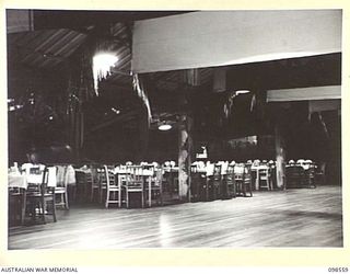 LAE, NEW GUINEA. 1945-10-22. THE OFFICERS' CLUB AT HEADQUARTERS AUSTRALIAN ARMY CANTEENS SERVICE